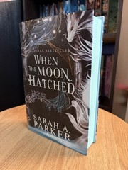 When The Moon Hatched by Sarah A. Parker Hardcover with Blue Sprayed Edges
