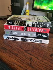 Lot of Science Fiction books Michael Crichton, Ernest Cline, Charles Stross